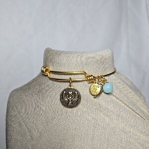 Gold Charm Bracelet with Angel Theme Pendants